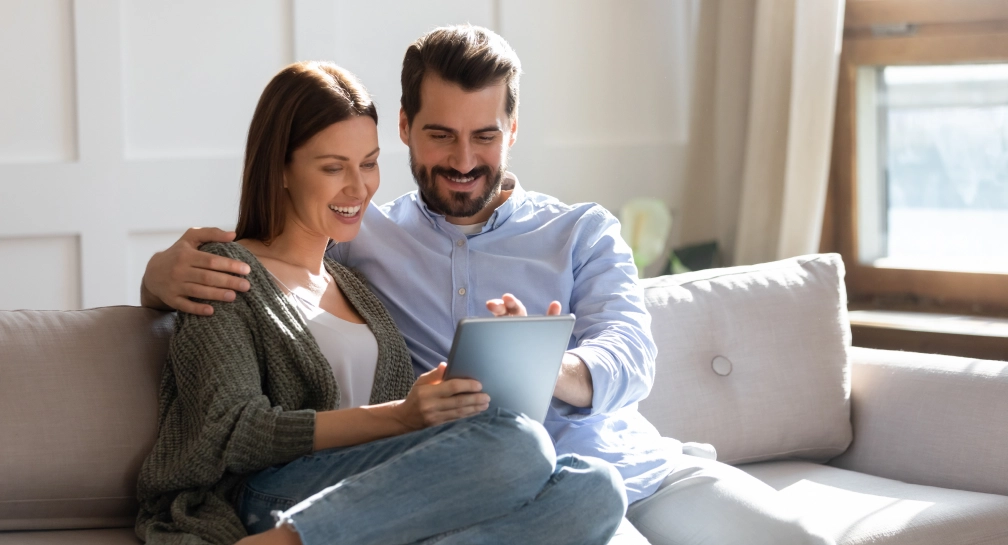 Couple looking at tablet